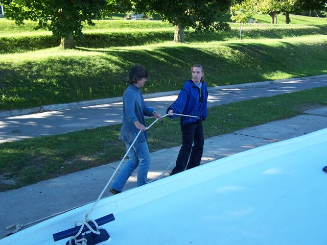 Two of the crew ashore, handling the lines