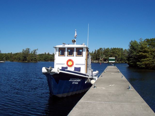 Tied up at a dock in the sun