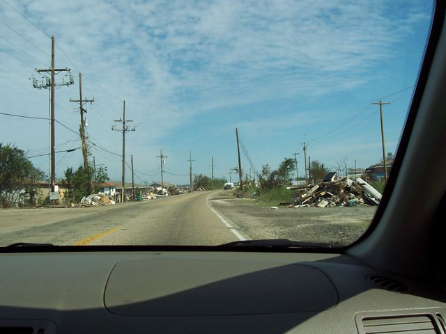 Piles of debris beside the road